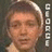 A static image divided into four quadrants with orange and gray sections containing text and a pixelated portrait.