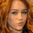 Four- shows a woman with red hair, a reclining pose on furniture, black-and-white portrait, and green background with 'mily' text