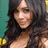 A pixelated image shows a person with long dark hair against a teal background, next to an orange displaying "Vanessa <3" in black text