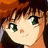 A pixelated anime-style character with orange hair and green eyes on the left, next to a black background with white text "Anime IM" above smaller cursive text "COM" on the right.