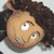 Animated sequence showing three distinct character views: a smiling figure with brown curly hair, a blue-toned figure with dark hair, and a black cat with blue and white eyes on a purple background.