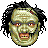 Pixelated face with greenish skin, black spiky hair, red eyes, and a mouth showing teeth, set against a gray background.