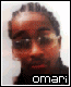 Pixelated portrait of a person with dark hair styled in braids, wearing glasses and a black top against a light background.