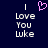 Dark blue background with white pixelated text reading "I Love You Luke" and a pink heart symbol above the word I.