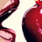 Pixelated close-up of a person's face with red lips and dark hair, accompanied by red text reading 'sweet and yummy' on a light background.
