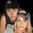 Two people pose closely together against a black background with green pixelated text reading "I LOVE EDDIE BLACKBURN" on the right.