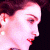 A 50x50 pixel animated buddy icon featuring a side-profile of a person with dark hair and red lips on the left, transitioning to green text reading "Original Icons .com" on a solid green background on the right.