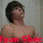 Pixelated image of a shirtless person with dark hair, red text at bottom reading 'Cyan Shee', gray background.