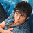 A person in a blue shirt lies on a blue patterned surface with one hand near their chest, while the word "HOT!" appears in blue text with black outline and two heart symbols.