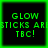 Four identical square with black backgrounds and green borders display pixelated text reading "GLOW STICKS ARE TBC!" in bright green