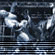 Animated sequence of a figure in dark clothing with white highlights performing repetitive motion against a striped background.