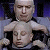 A 50x50 pixel animated contact sheet showing two frames of a character with multiple heads against a dark background, alongside green text reading "Original Icons .com" on a solid green backdrop.