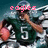 Pixelated image of a football player in green jersey with number 5, helmet, and pink text above head changing from 'eagles' to 'rule'.