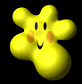 Yellow flower-shaped character with orange cheeks and black eyes, smiling against a black background.