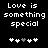 Black background with white pixelated text 'Love is something special' and five heart symbols below, where the third heart changes from gray to white