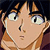 Pixelated cartoon-style face with wide eyes, light brown hair, and a neutral expression against a dark background.