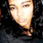 A pixelated image of a person with long dark hair wearing a black top, overlaid with green text reading "FvKn Supa Star" on the right side.