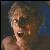 A pixelated image split into two sections: a blurred figure on the left and stylized text reading 'Creature of the NIGHT' on the right with purple accents.