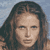 Pixelated static image of a person with long dark hair against a light blue background, rendered in low-resolution 256x256 pixels with visible dithering and color blending.