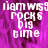 Pixelated text on a purple background with a gray rectangle in the bottom right corner.