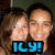 Two people pose closely together in a pixelated image with blue text reading 'ICY!' at the bottom.