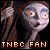Pixelated image of a character with wide eyes and an open mouth, wearing dark clothing against a black background, with text at the bottom reading "TNBC FAN".