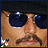A contact sheet of 8 animated frames showing a man with dark sunglasses, mustache, and black cap in close-up view against a gray background.