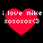 Red heart-shaped icon with white text 'i love mike xoxoxox<3' on black background, showing pixelated animation changes