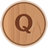 Circular wooden-textured icon with a brown 'Q' centered on a light brown background.