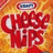 A pixelated image of a Cheetos bag with overlaid text reading "Megan is nips" and "Rachael is cheese." The background features orange and red hues typical of the product packaging.