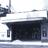 Static pixelated image of a dark rectangular structure with lighter horizontal bands above and below, set against a light background.