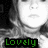A pixelated grayscale image of a person's face with green text reading 'Lovely' at the bottom.