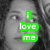 A black-and-white photo of a person with curly hair, featuring green text "i love me" on the left side and pink text "maddie hanna <3" on the bottom-left.