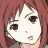 A pixelated anime-style character with reddish-brown hair and large brown eyes on the left, next to a black background with white text reading "Anime IM" above smaller stylized text "COM" on the right.