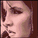 25 pixelated profile images showing a person's face in side view with varying color filters