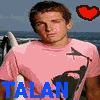 A person in a pink shirt with a black graphic stands against a beach background with surfboards, text "TALAN" in blue, and red hearts above.