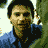 A pixelated animated sequence shows a person in a blue shirt with dark hair, transitioning through three distinct facial expressions against a green and white background.