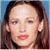 Static pixelated image of a person with long brown hair, light skin tone, and closed eyes against blue background.