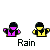 Pixel art animation of two figures in purple and yellow outfits with black hair, exchanging blue energy effects that grow into red explosions on a gray background.