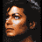 A 4-frame contact sheet of pixelated Michael Jackson images with a watermark, showing different facial expressions and angles in a grid layout.