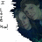 Pixelated image split into two sections: left shows partial figures with dark hair and gray tones; right displays green background with black text reading 'Evan + Michaela Forever' in pixel font.