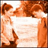 A sepia-toned animated sequence shows two people standing outdoors near a fence, with text and script changing across frames.