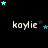 A black background displays the name 'kaylie' in light gray text with animated blue and dark blue stars moving around it.