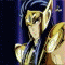 Anime character in golden armor with blue helmet and winged shoulder guards, transitioning from static pose to glowing yellow aura with motion blur effects.