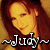 Pixelated image of a person with light skin and brown hair, featuring stylized text reading "Judy" in white letters at the bottom.
