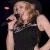 A split-frame contact sheet showing a woman singing into a microphone on the left and green text reading "Original Icons .com" on the right, both in pixelated style.