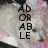 A pixelated image of a white dog with pink and black background elements, featuring overlaid text and a pixelated 'Awwww' graphic.