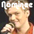 Four pixelated show a person in different poses with text overlays: 'Nominee At' top-left, 'Time Awards' bottom-right
