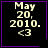 Black background with light gray text reading 'May 20, 2010.' and '<3', framed by purple border with a small purple heart in top-right corner.