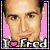 Pixelated portrait of a person with light skin and dark hair, framed by pink border with cyan dots, text "I ❤️ Fred" at bottom.